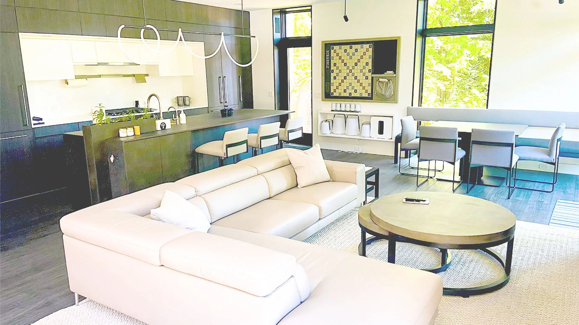 Bright custom interior with modern kitchen and living area